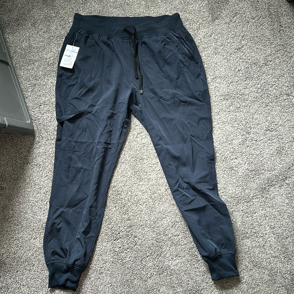 Never been worn set of navy scrubs